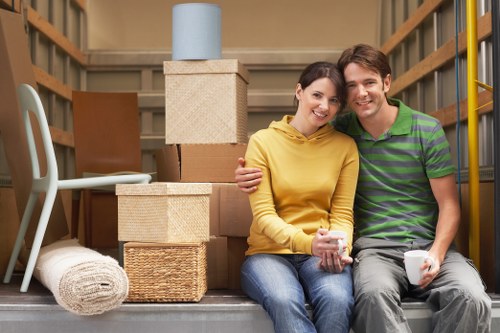 Professional movers handling furniture efficiently