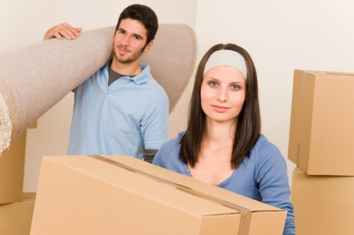 Professional removal team loading belongings into a truck